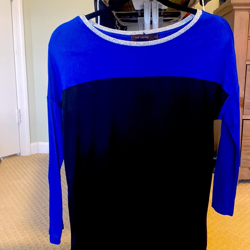 The limited size medium long sleeve shirt.